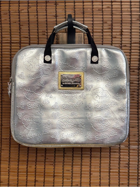 Betsey Johnson Handbags - Betseyville Silver Metallic Laptop Bag Embossed Lip and Flaral Pattern